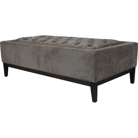 Warm grey ottoman with buttoned fabric and dark wooden legs