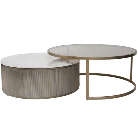 Round nesting tables with aged gold frames and marble tops.