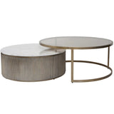 Round nesting tables with aged gold frames and marble tops.
