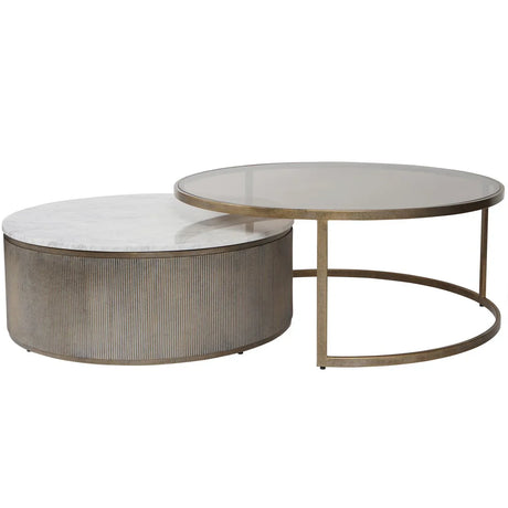 Round nesting tables with aged gold frames and marble tops.