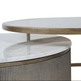 Aged gold nesting tables with marble and glass tops.
