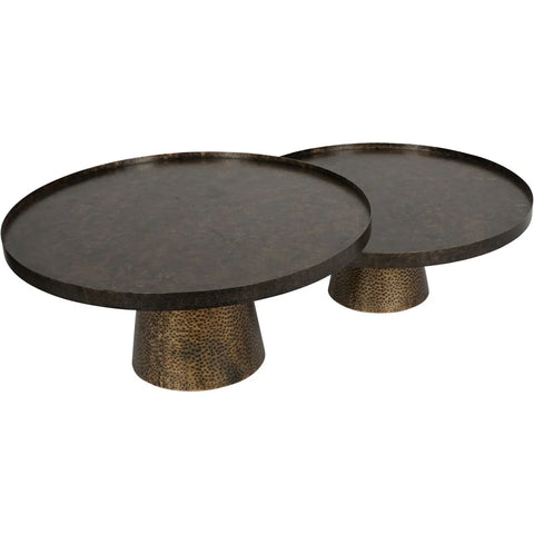 Two round iron coffee tables with textured antique gold finish.