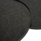 Rustic antique gold iron table tops with textured surface detail.