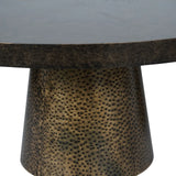 Dark tabletop with textured antique gold base detail.