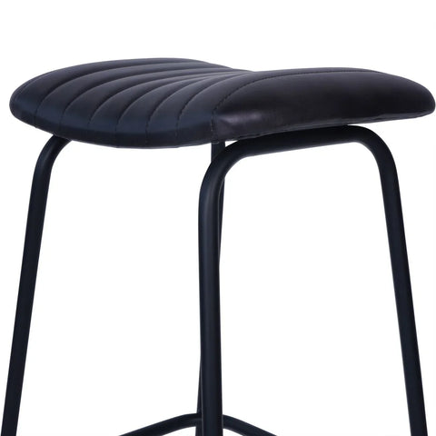 Charcoal leather bar stool with ribbed seat and sleek black legs.