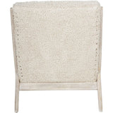 Beige textured chair back with light wood frame.