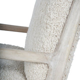 Beige textured chair fabric with light wood frame detail.
