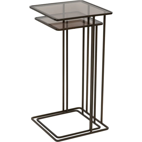 Dark gold metal side tables with glass tops, nested design.