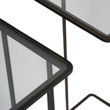 Dark bronze side tables with glass tops, corner detail.