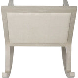 Beige fabric rocking chair backrest with light wood frame.