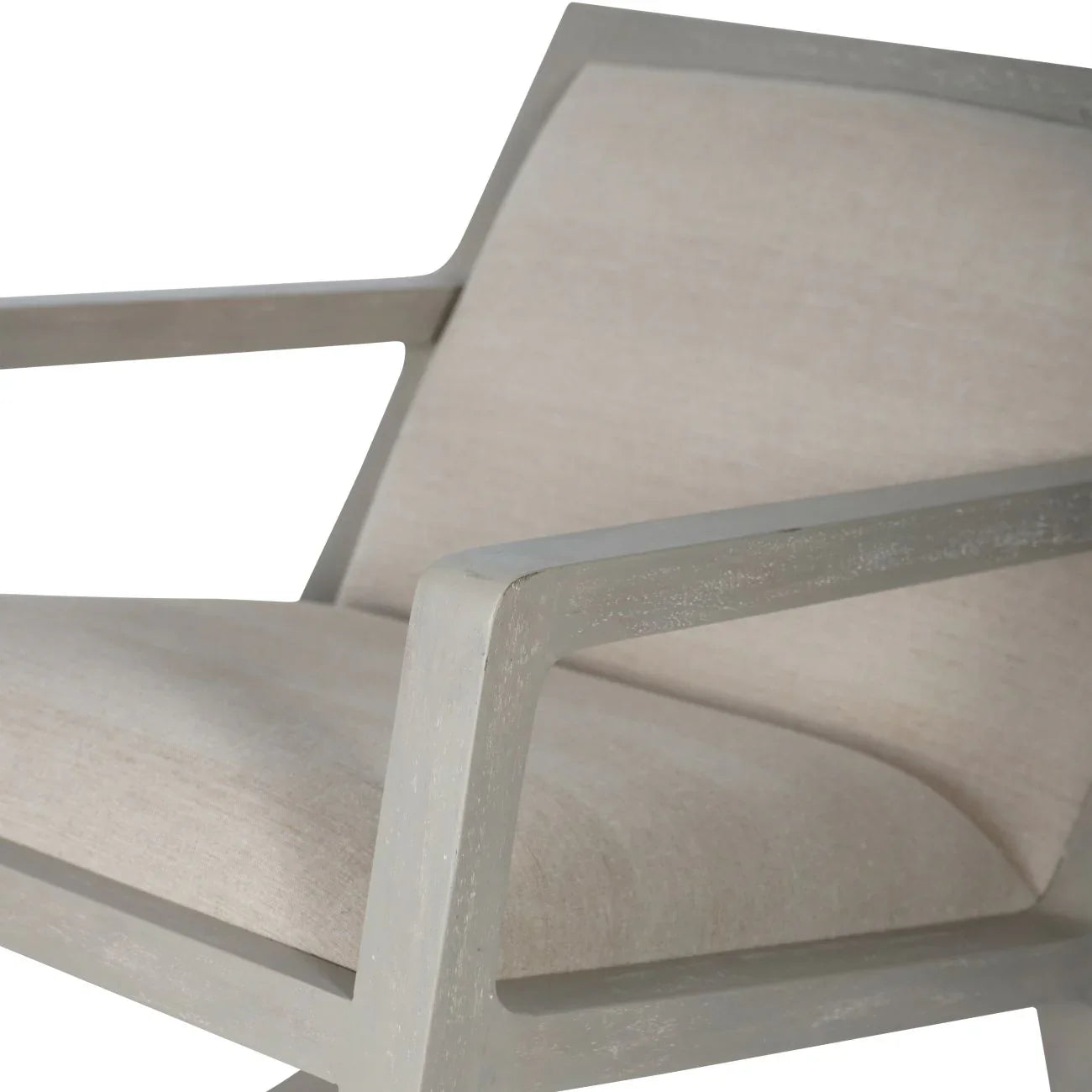 Beige cushioned chair with light wood frame detailing