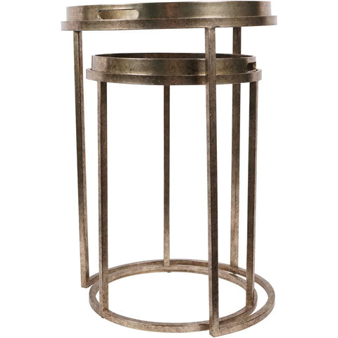Antique brass nesting tray tables with round frames and handles.