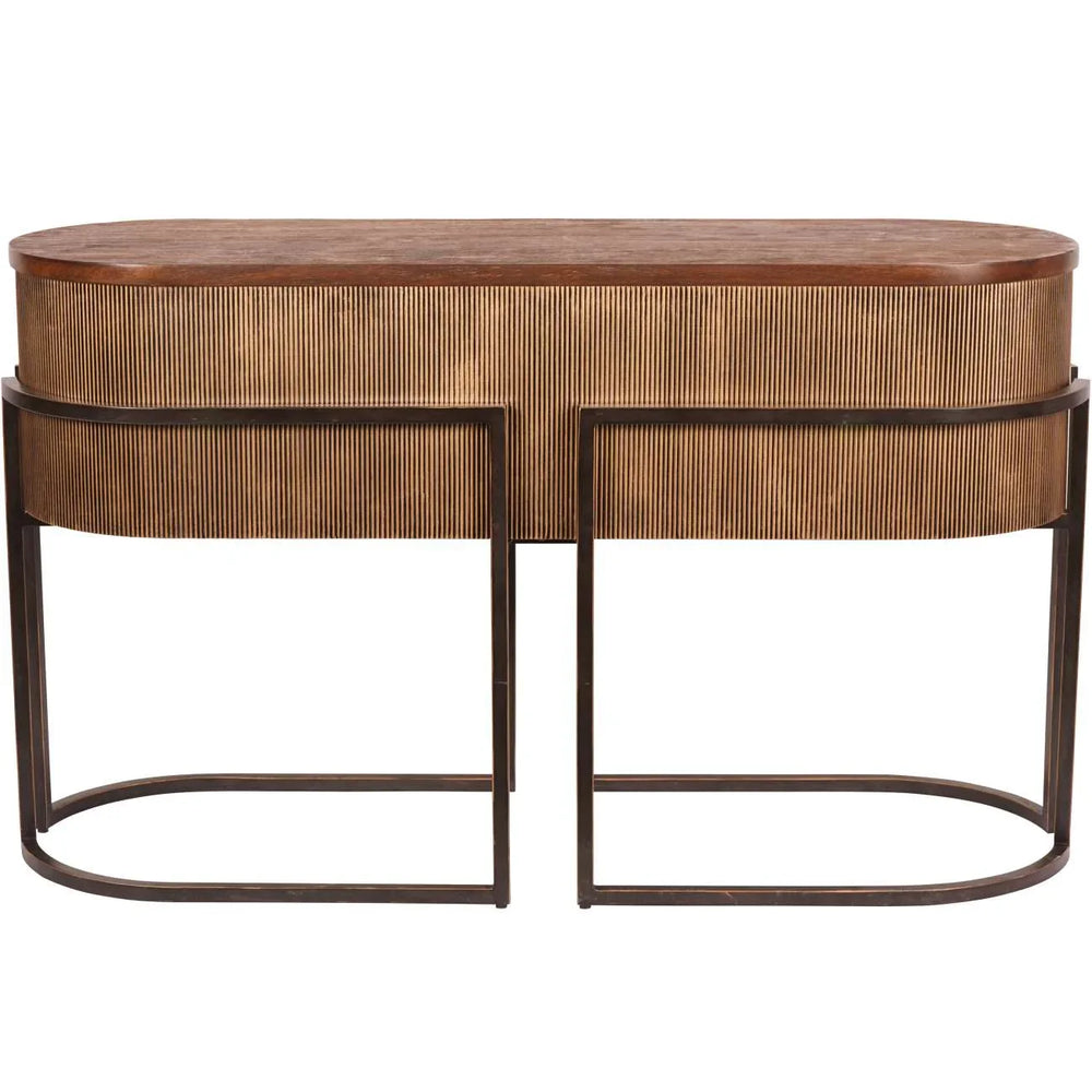 Gold console table with corrugated texture and curved metal legs.