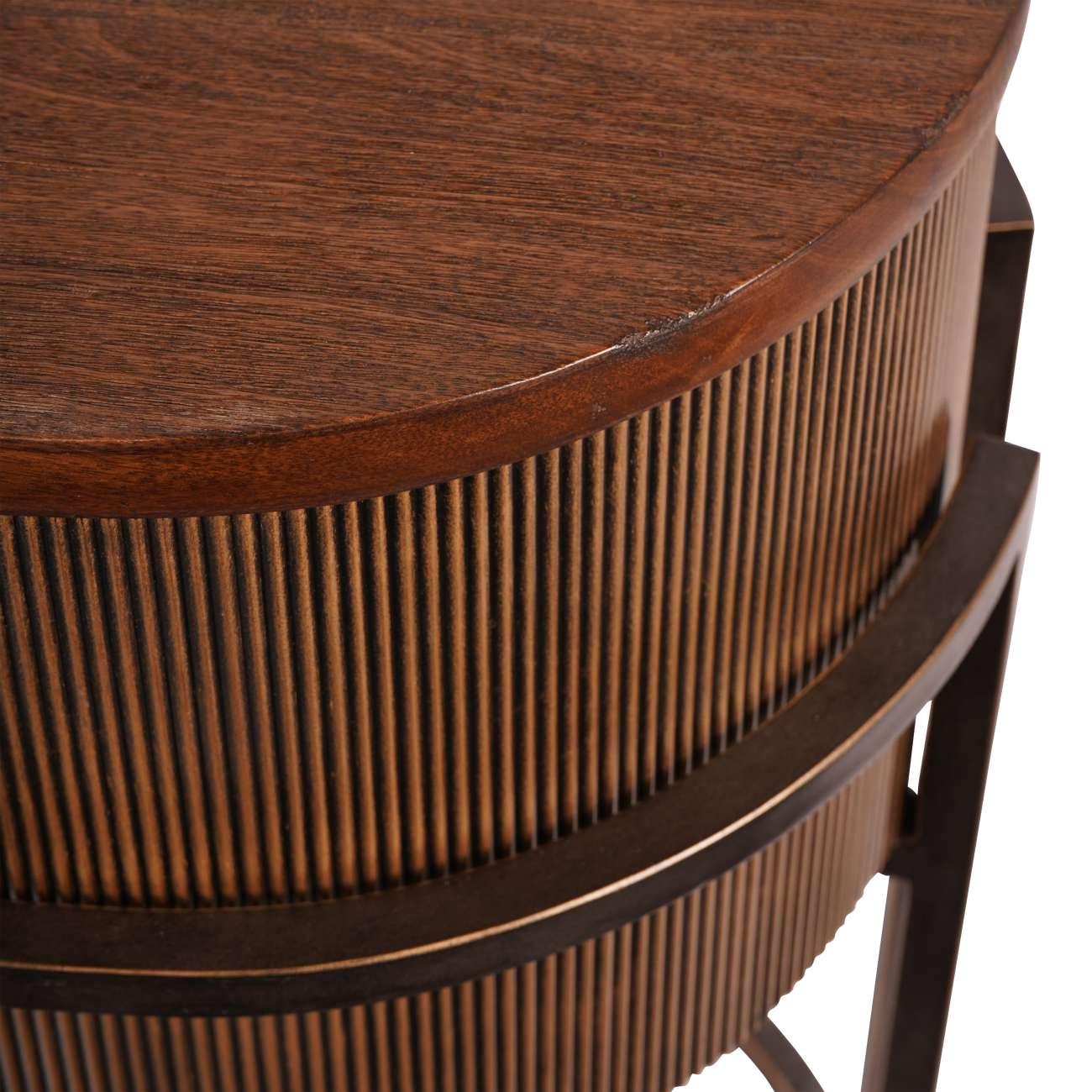 Curved brown wood console with ribbed texture detail