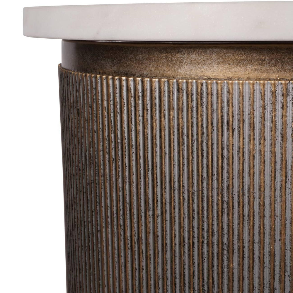 Ribbed aged gold console detail with white marble top.