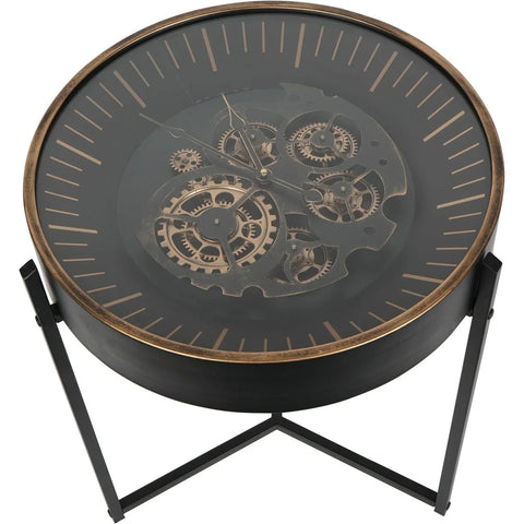 Black and gold table clock with visible moving cogs and minimalist stand.