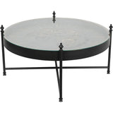 Black round coffee table with glass top and visible gold cogs.