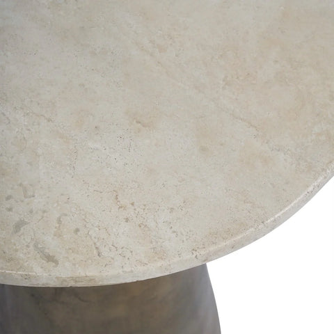Light travertine table surface with natural stone texture.