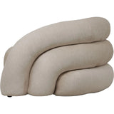 Cream upholstered chair with a unique, layered design.