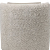 Cream textured fabric detail on storage bench surface.
