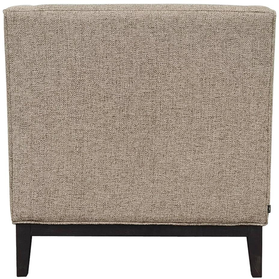 Back view of taupe armchair with textured fabric and dark wooden legs.