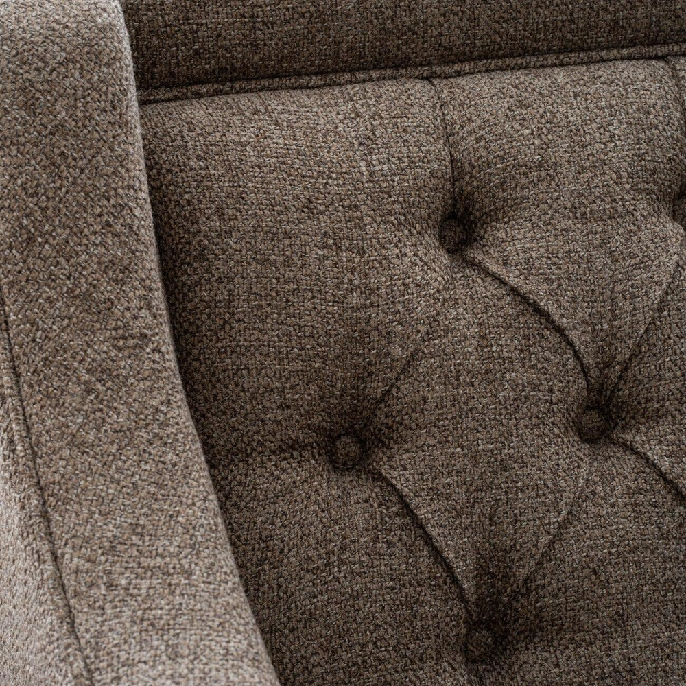 Dark taupe sofa with buttoned backrest and textured fabric detail.