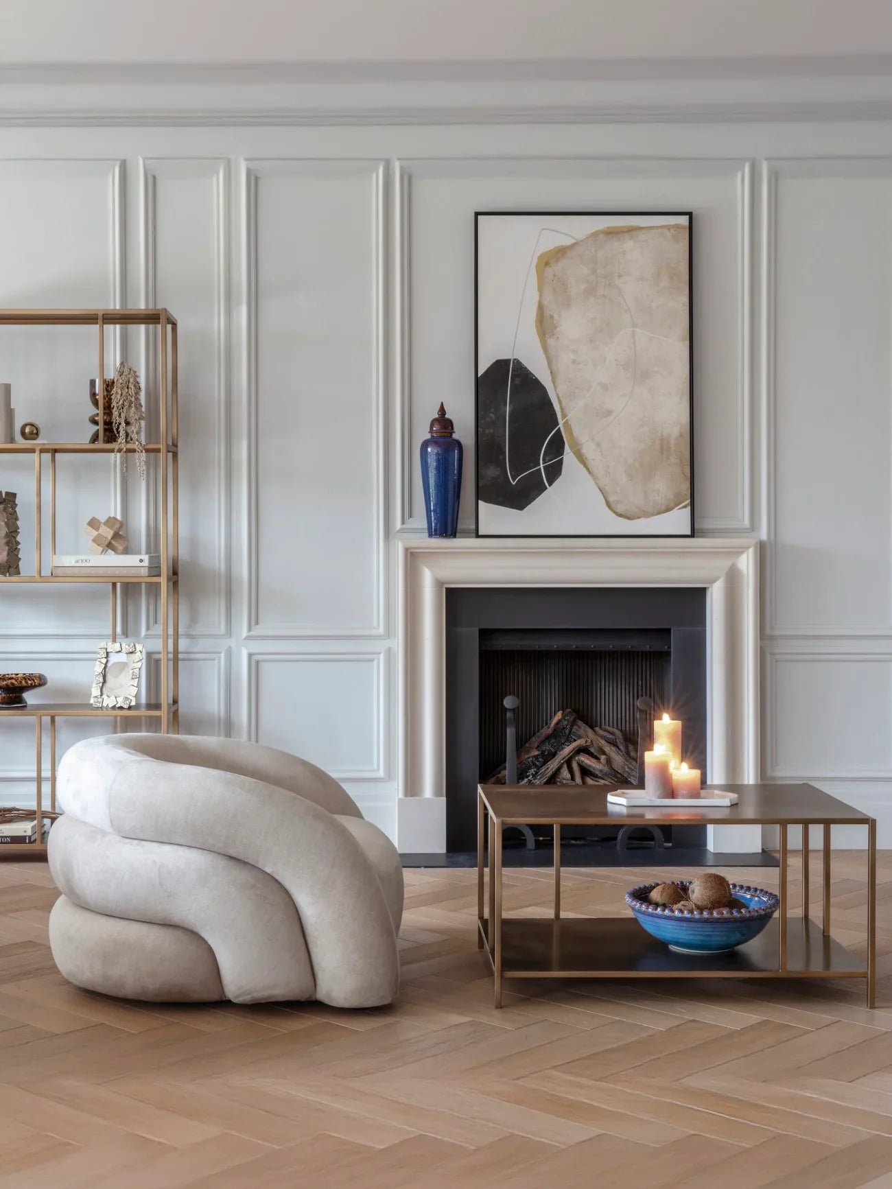 Brushed champagne coffee table in elegant living room with modern decor.