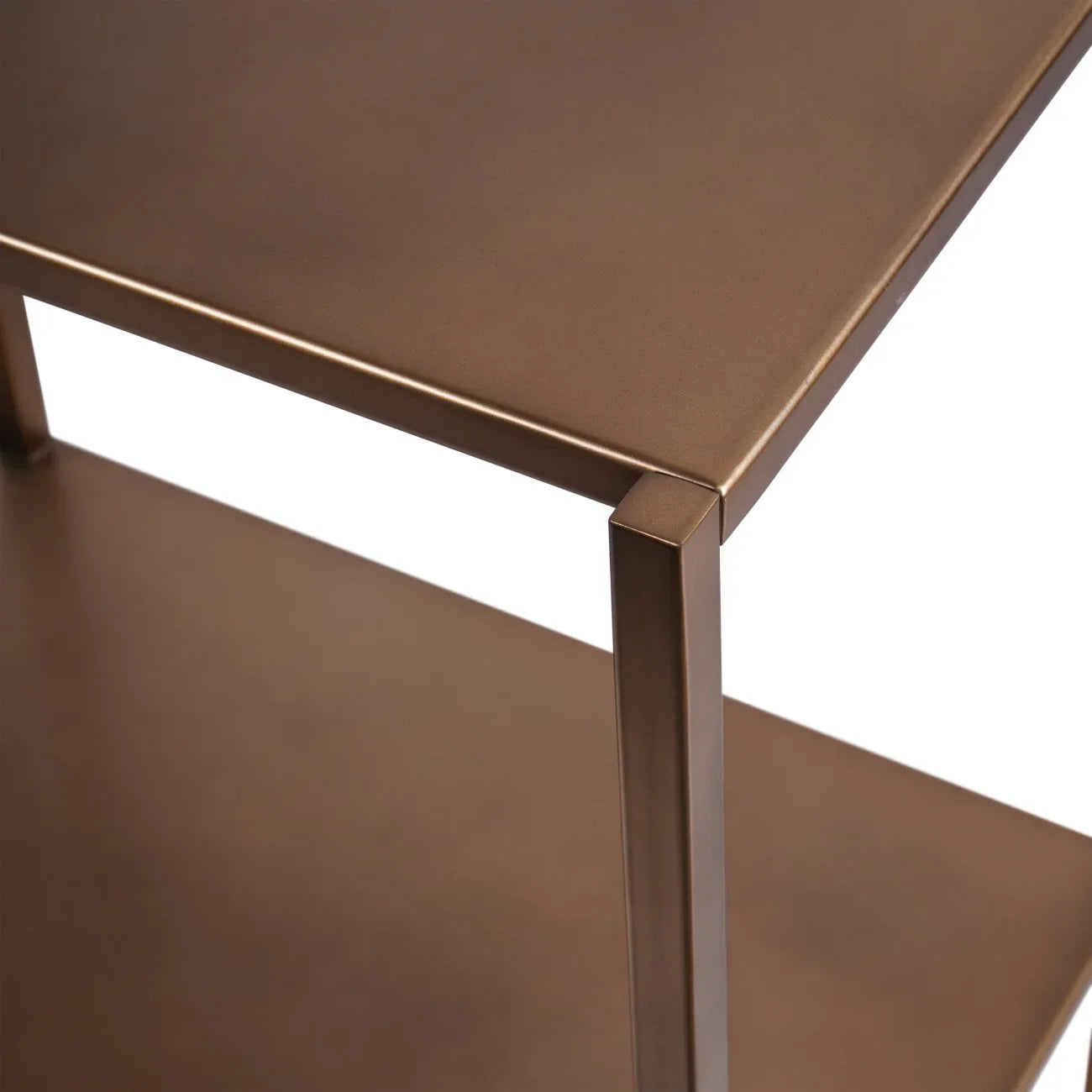 Brushed champagne table corner with smooth metallic finish