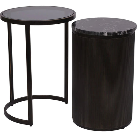Black nesting side tables with round tops and sleek bases.