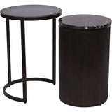Black nesting side tables with round tops and sleek bases.