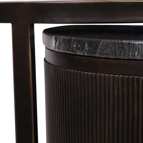 Black nesting table with ribbed texture and dark marble top.