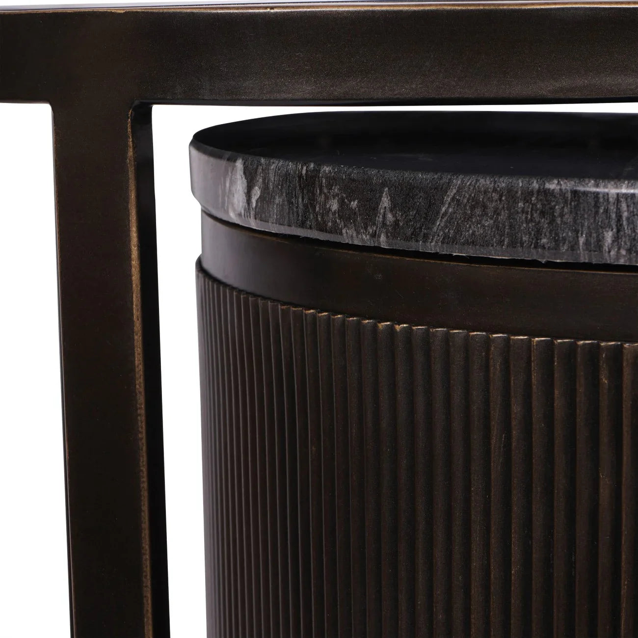 Black nesting table with ribbed texture and dark marble top.