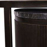 Black nesting table with ribbed texture and dark marble top.