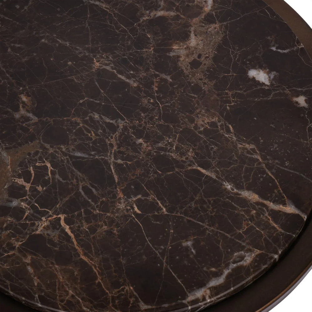 Brown marble table surface with intricate white veining.