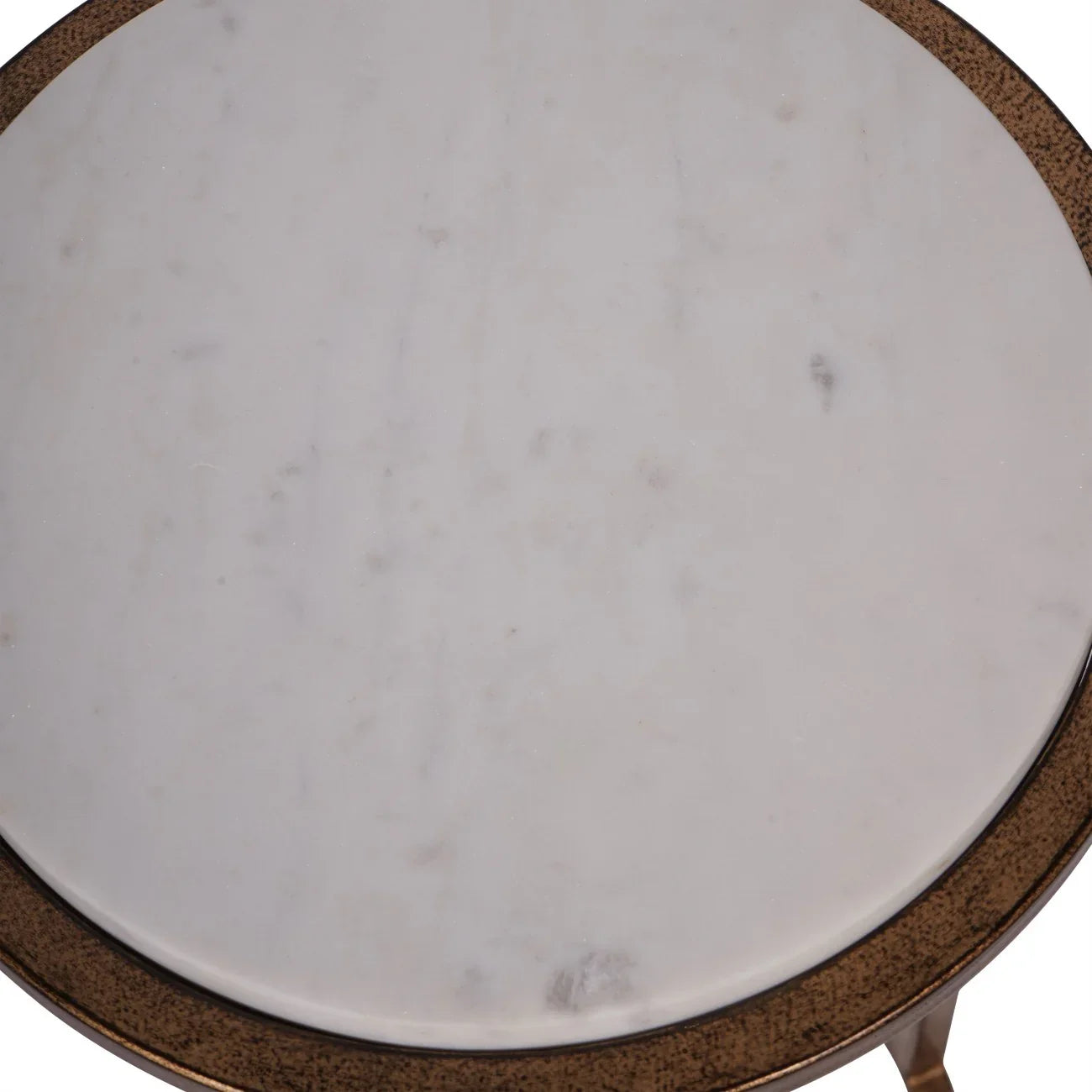 White marble tabletop with subtle veining and bronze edge detail.