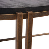 Black wood tabletop with champagne metal legs detail.