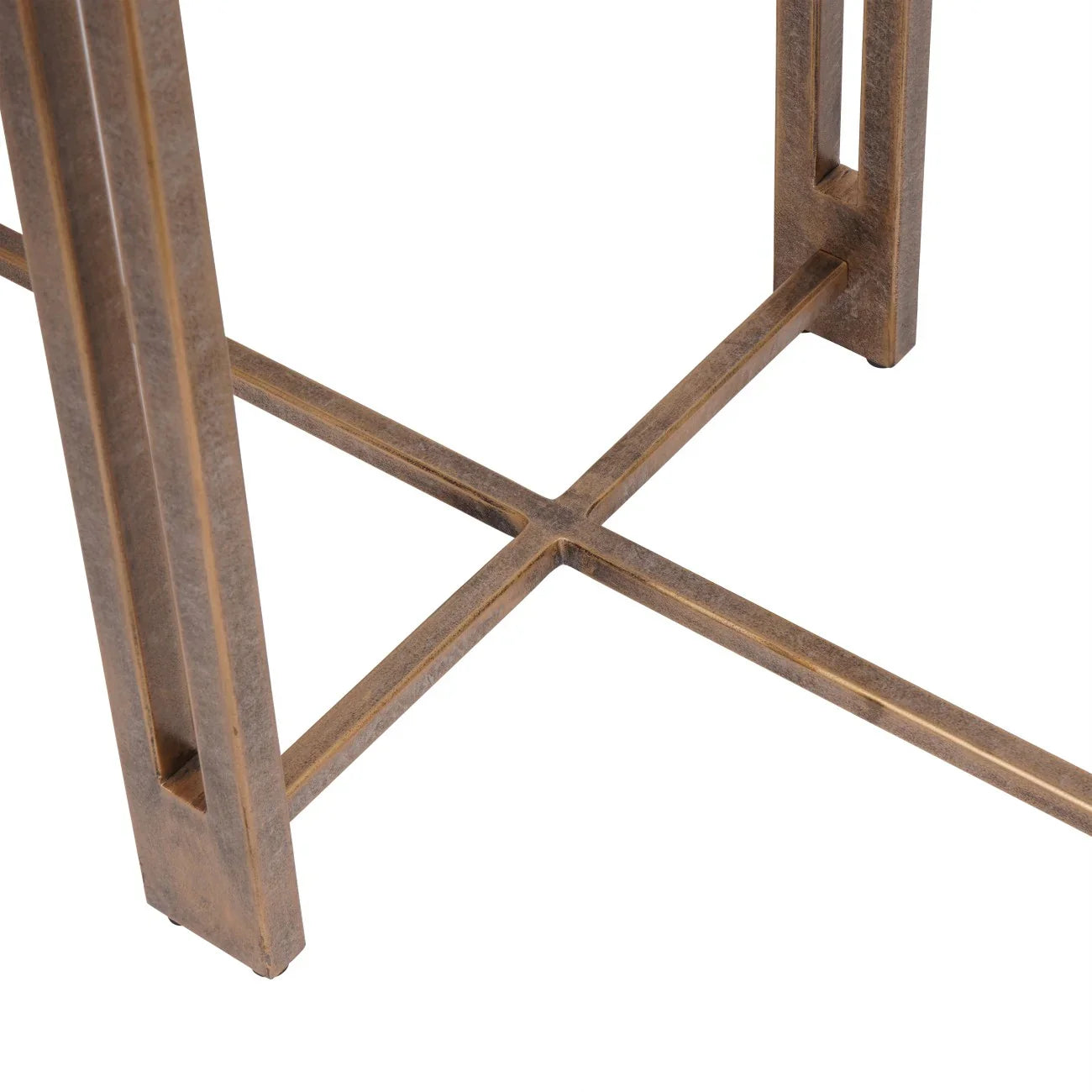 Champagne frame detail with crossbar design on console table.