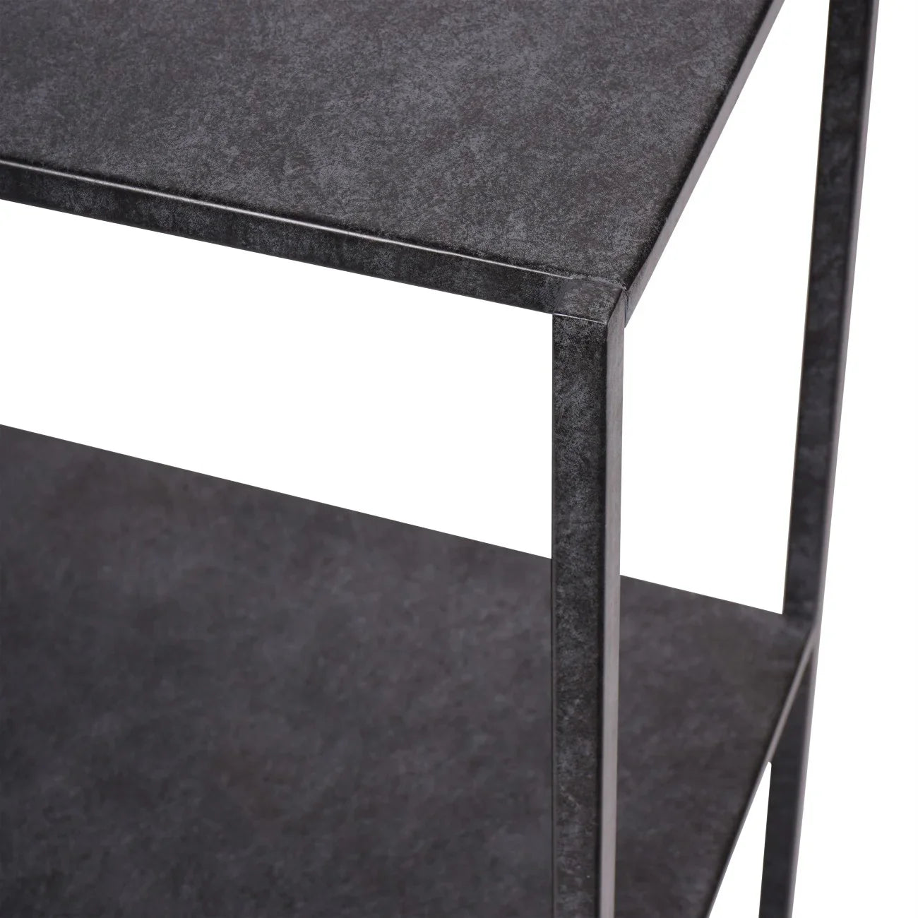 Dark mottled finish console table corner detail.