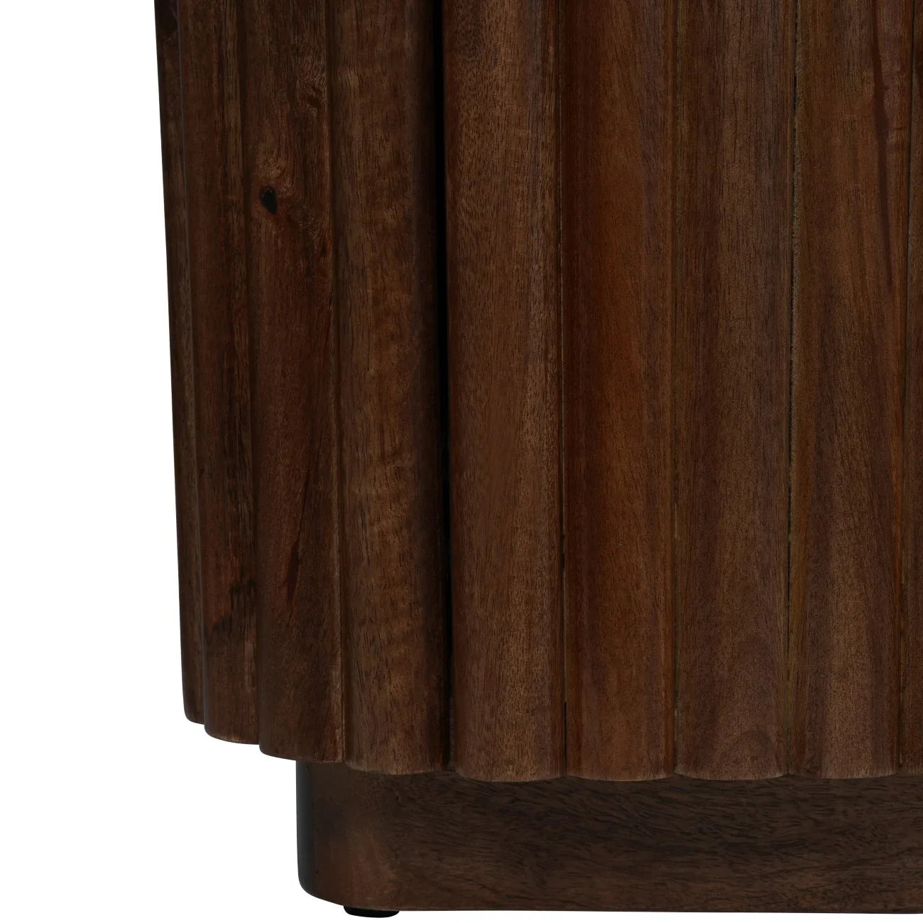 Dark wood sideboard corner with vertical panel detailing.
