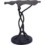 Dark cast aluminium side table with intricate leaf top and twisted stem design.