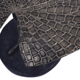 Textured cast aluminium surface with intricate leaf pattern detail.