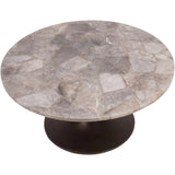 Round table with smokey quartz top and dark base, overhead view.