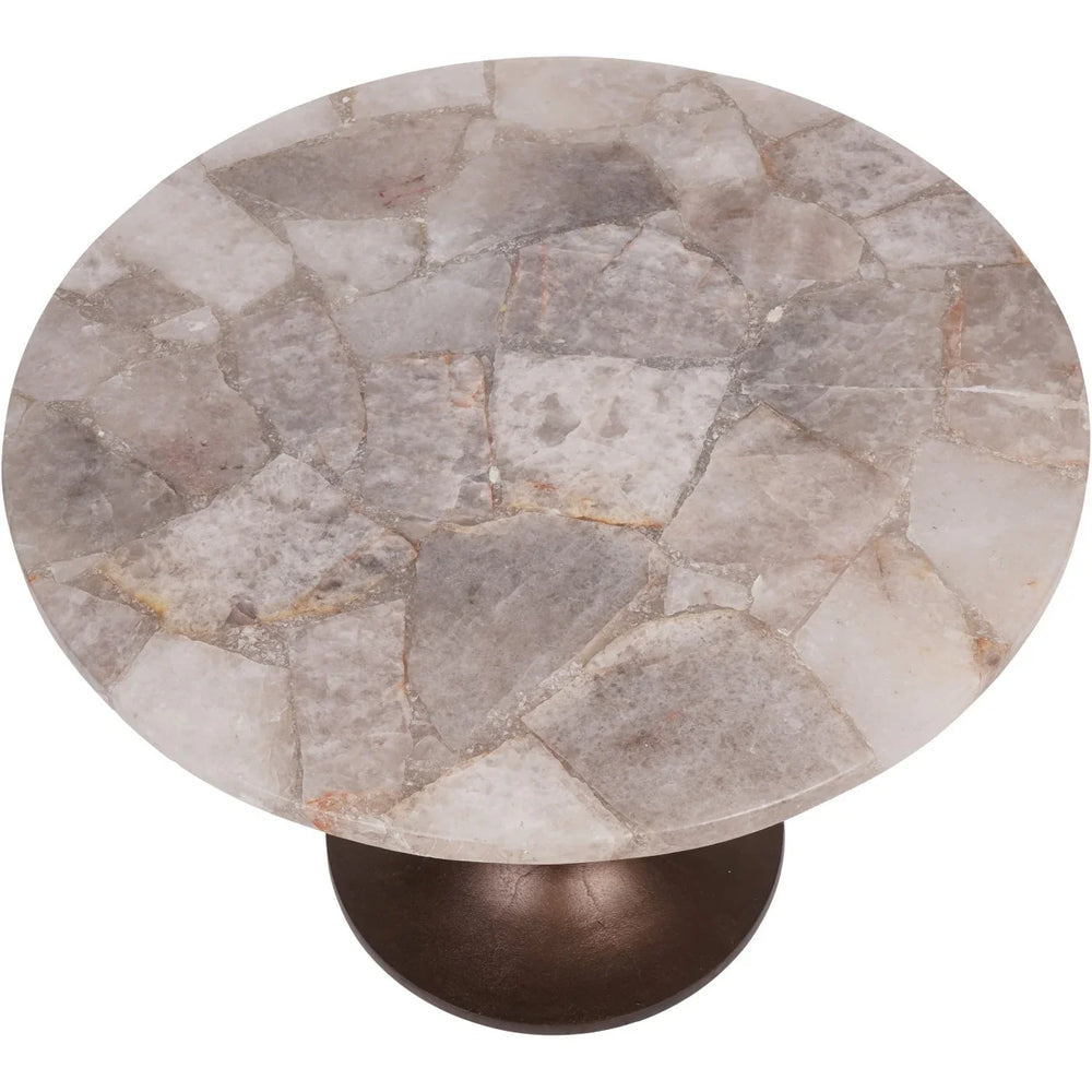 Round table with a mosaic quartz top and a bronze base.