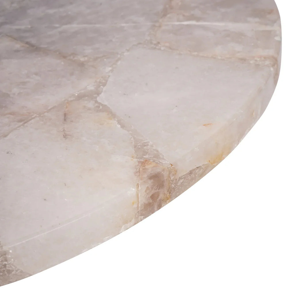 Smokey quartz tabletop with natural stone texture and subtle color variations.