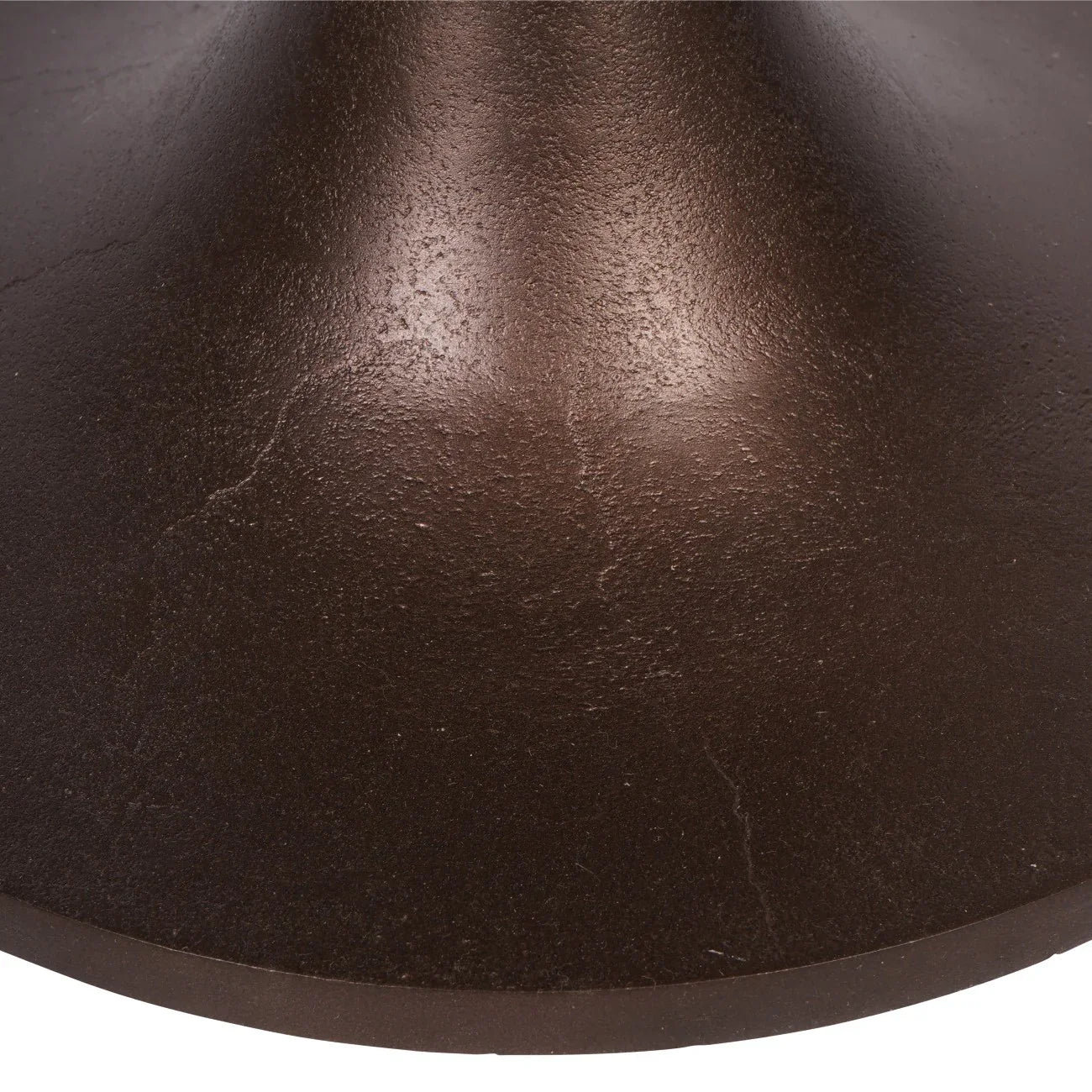 Dark brown textured base of a side table with a smooth finish.