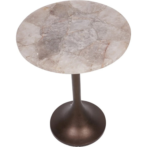 Round quartz top side table with bronze pedestal base.