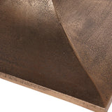 Bronze textured surface with subtle speckled pattern on table base.