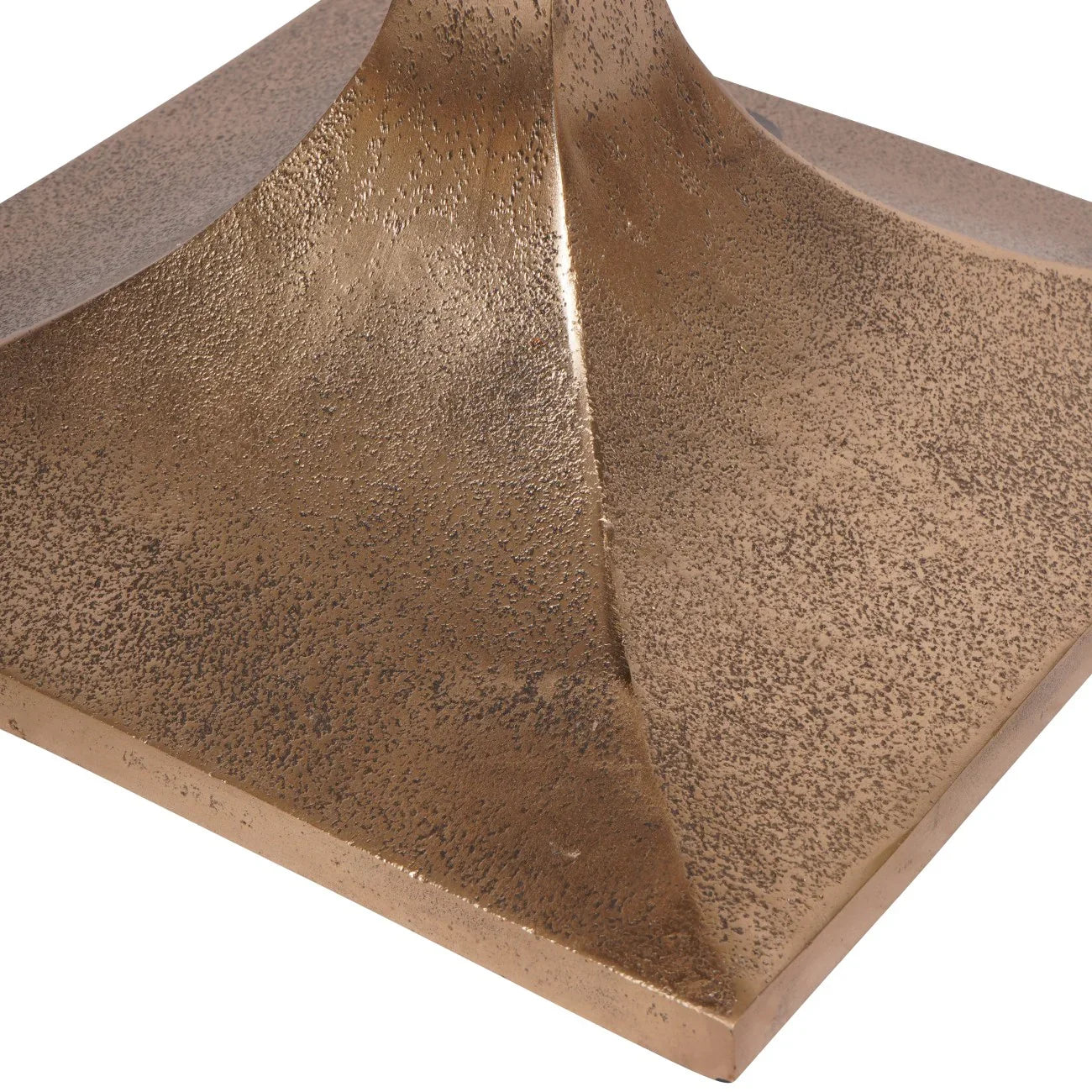 Bronze textured base of a side table with a matte finish.