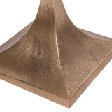 Bronze textured base of a side table with a smooth finish.