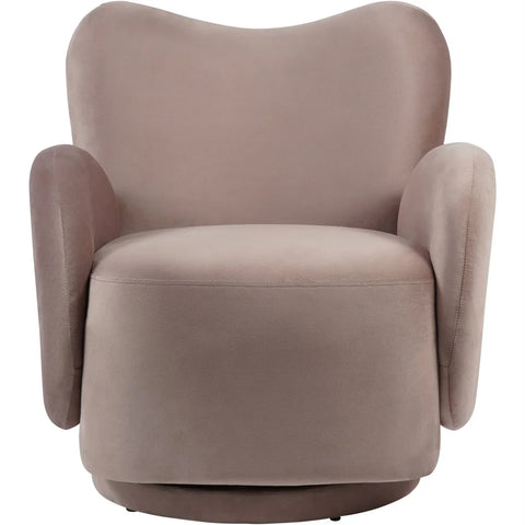 Dusky pink velvet swivel chair with rounded back and armrests.